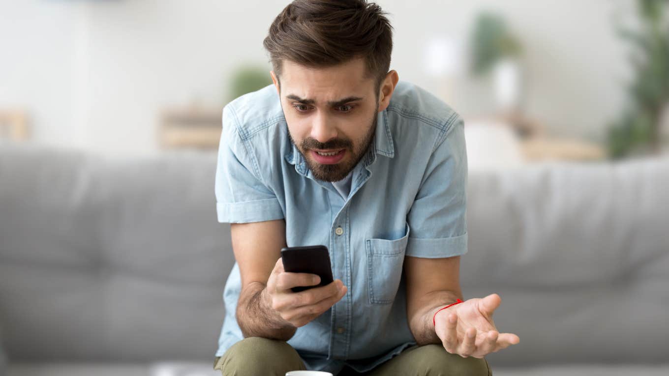 Man looking frustrated talking with his DoorDash driver online. 