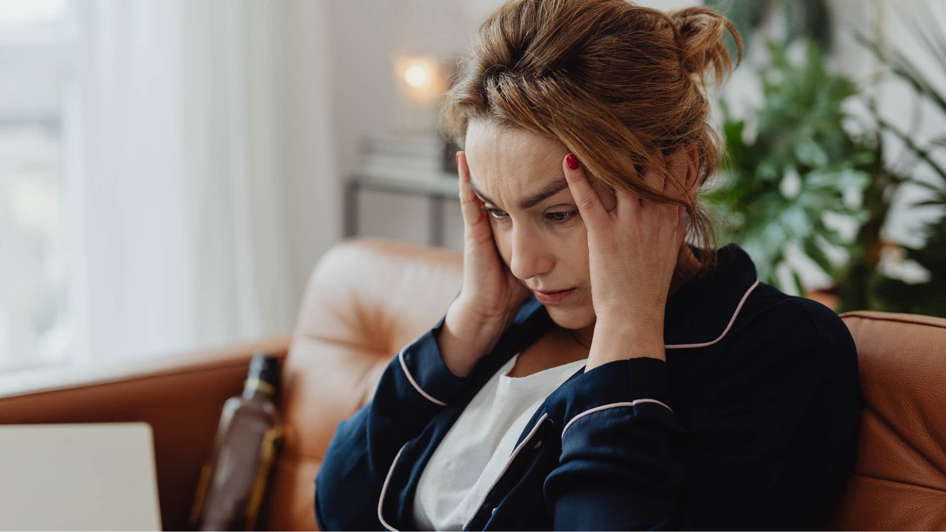 Frustrated narcissistic woman looking frustrated at home. 