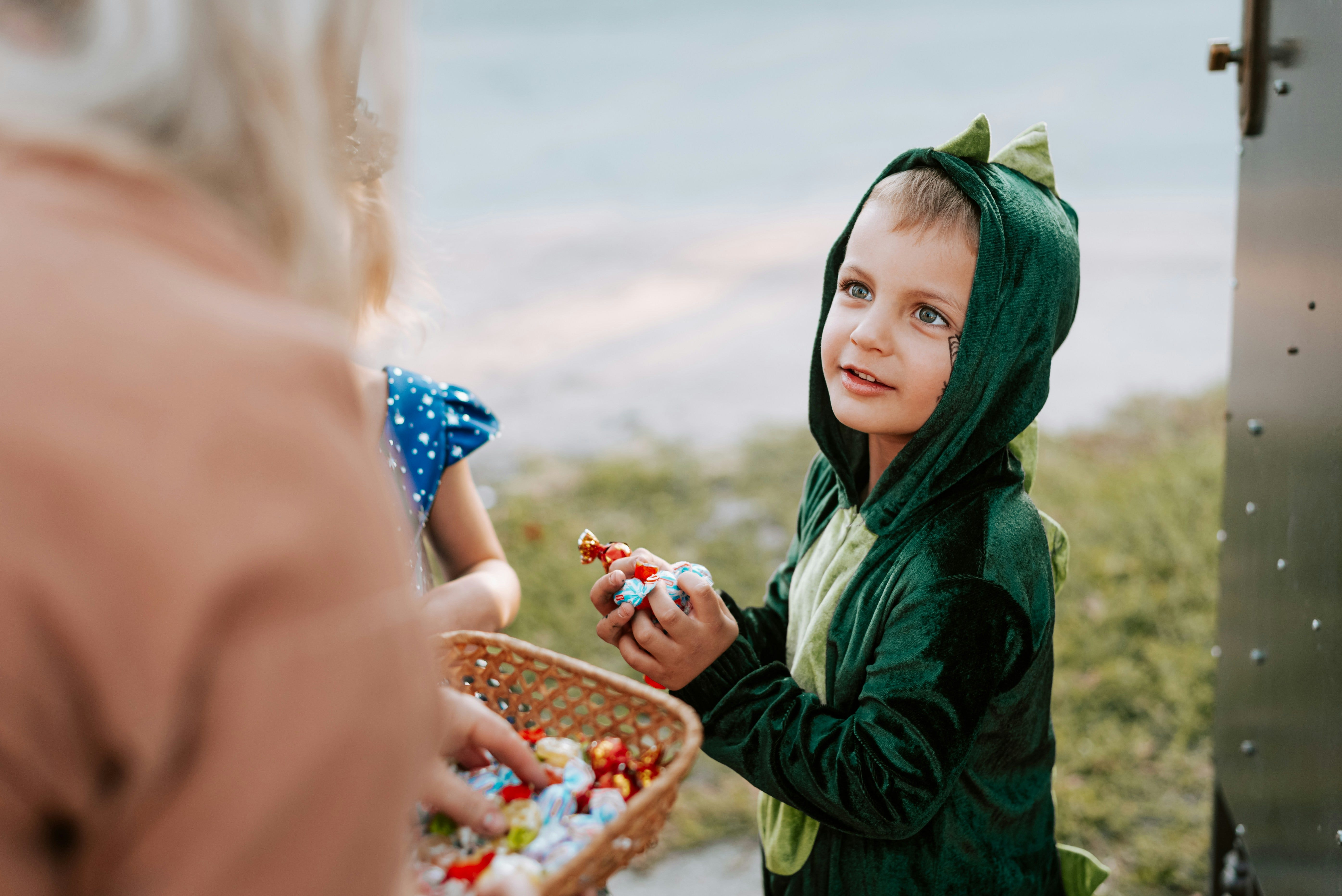 Child on halloween getting candy