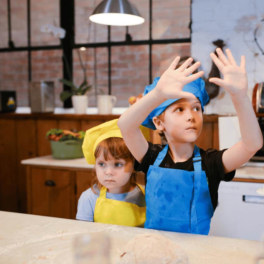 kids wearing aprons in a kitchen