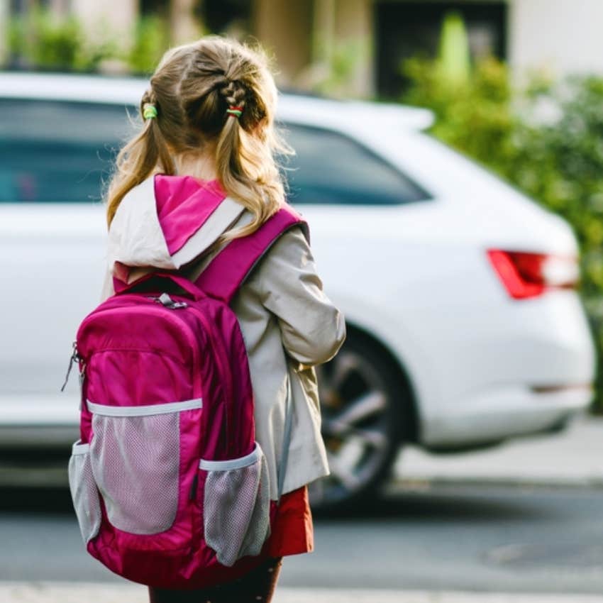 little girl leaving school