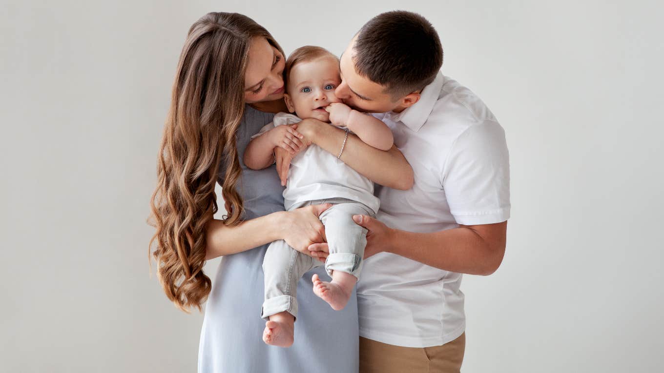 Man, wife, and baby