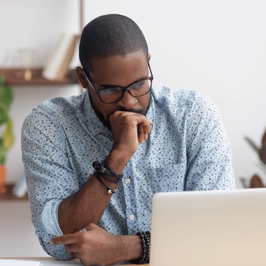 man focused on his laptop