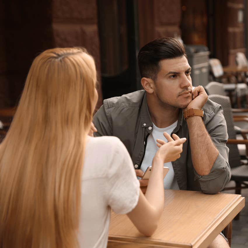 man ignoring a woman talking