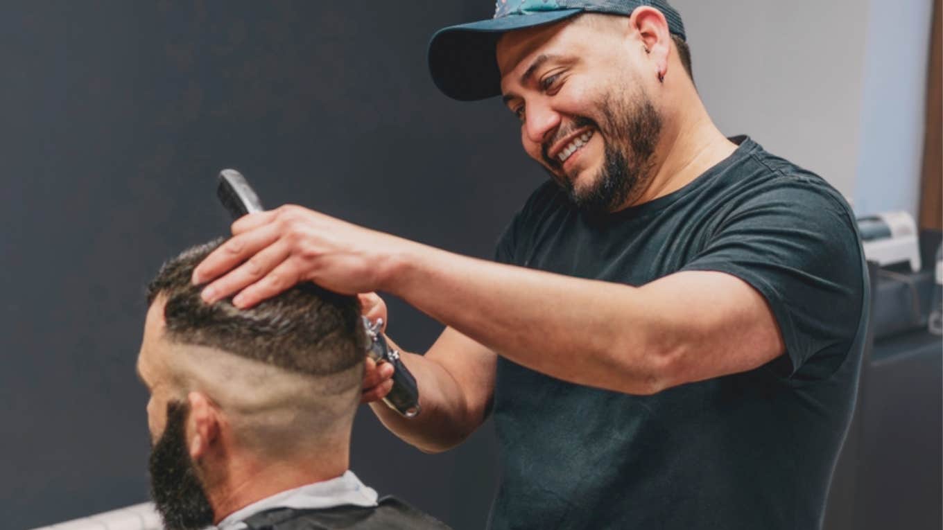 barber cutting man's hair 