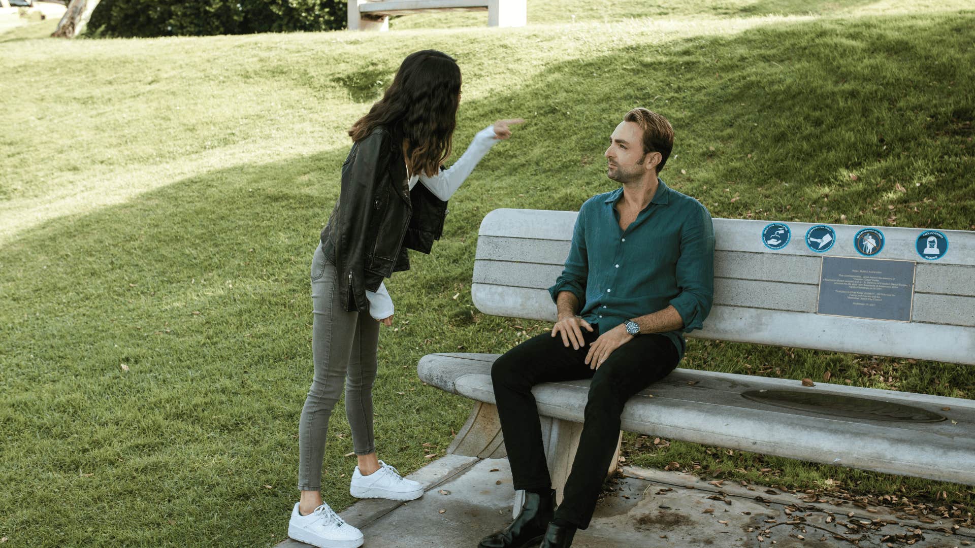 couple arguing in park