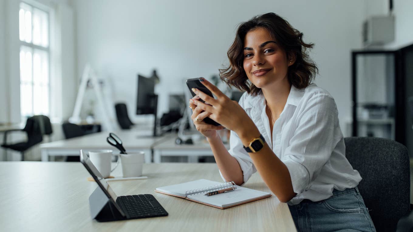 Worker with work email connected to cell phone