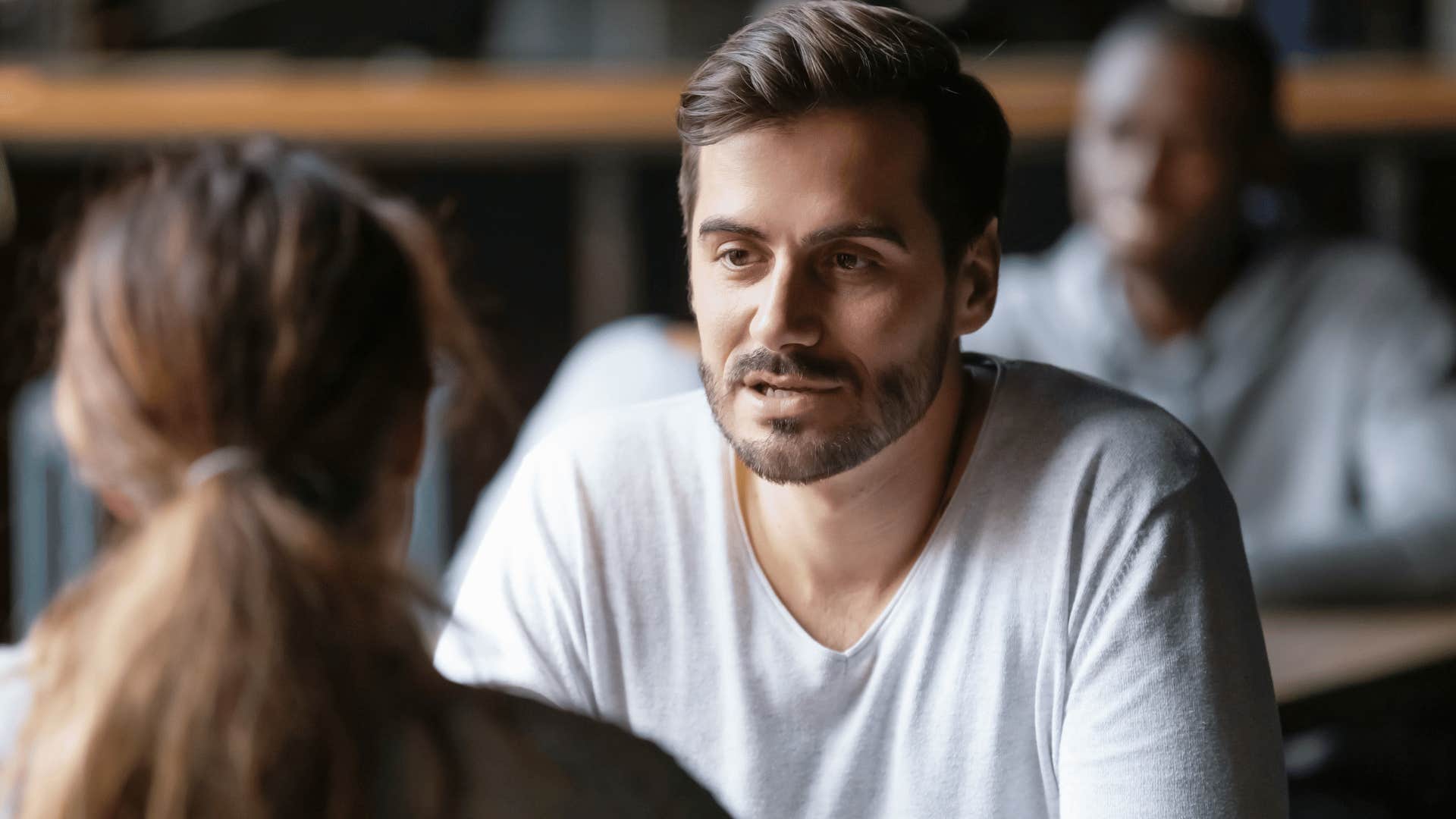 man chatting with woman