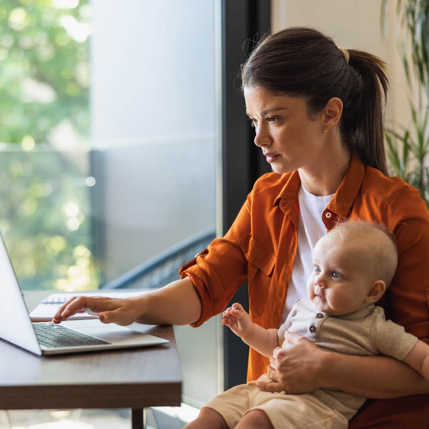 Mom checking Vrbo listing on computer