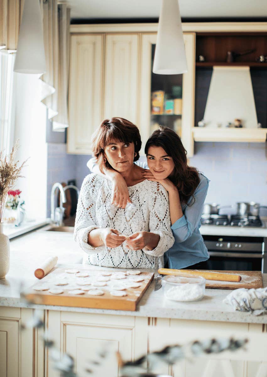 mom and daughter standing in a kitchen