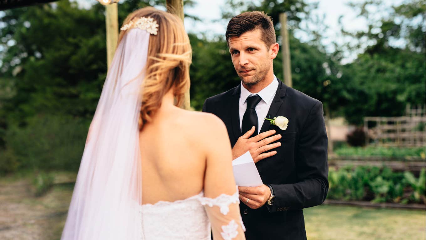 Man saying his heartfelt vows to his wife.