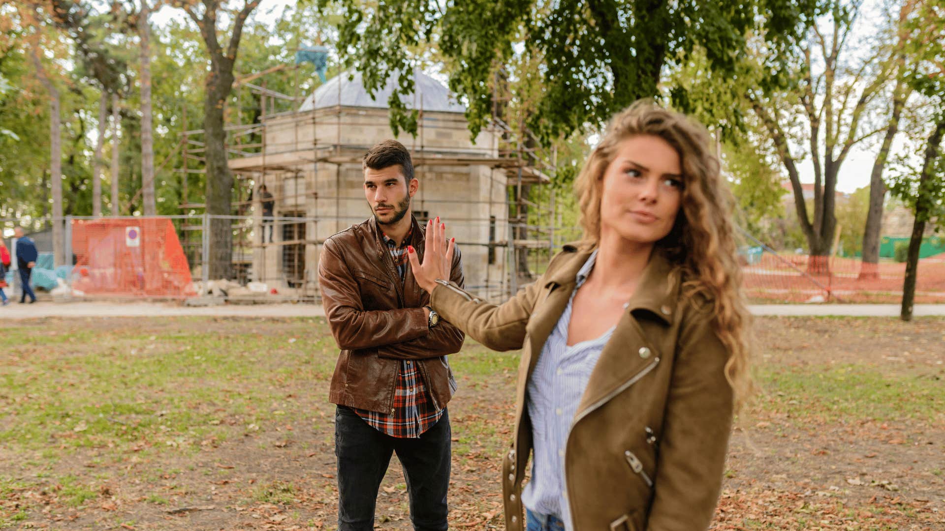 couple fighting in park