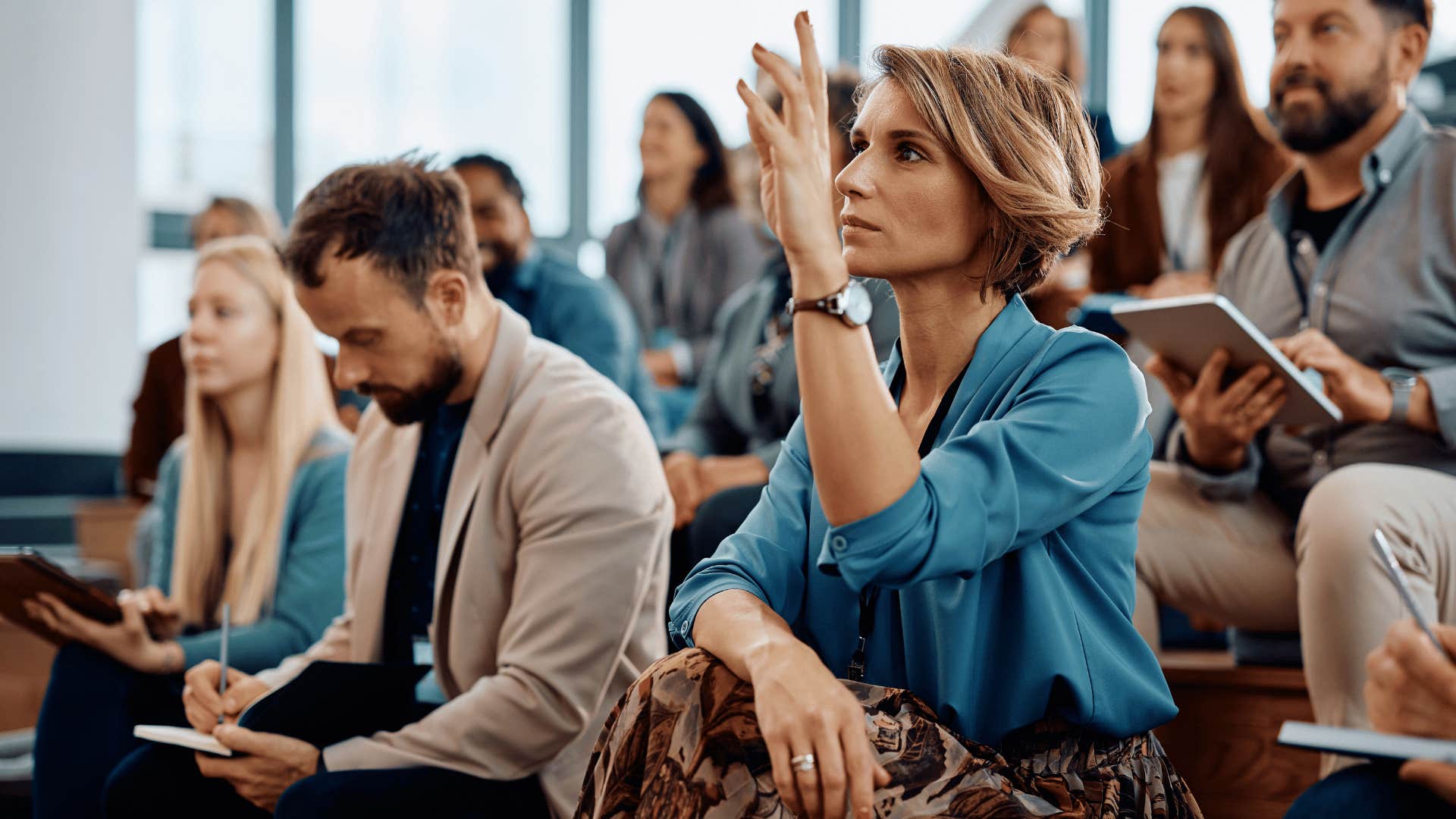 woman raising hands 