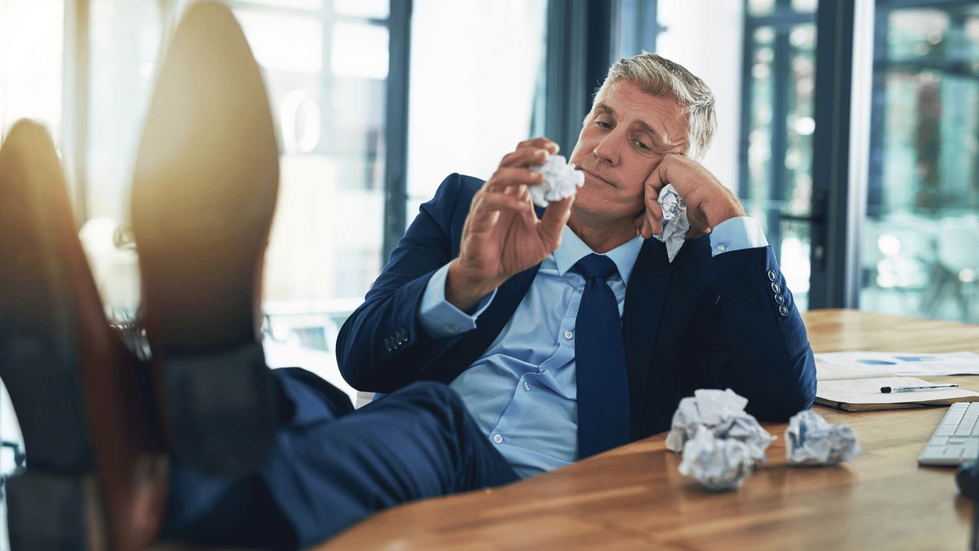 man relaxing in his office 