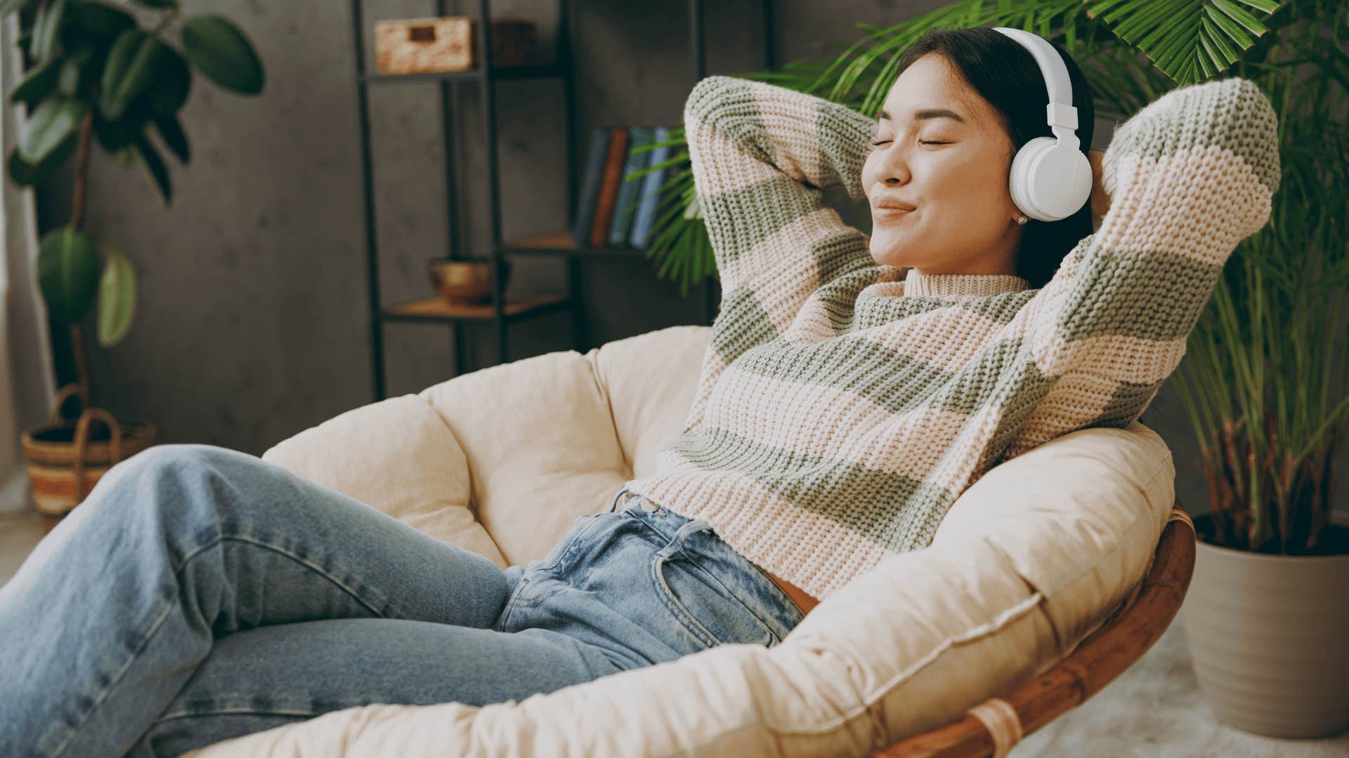 woman relaxing while listening to music