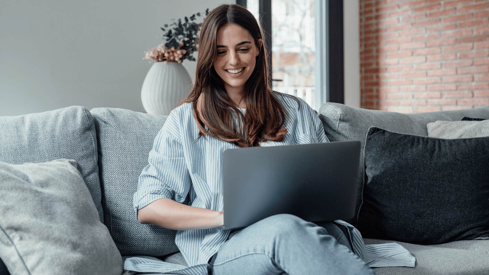 woman on laptop researching 