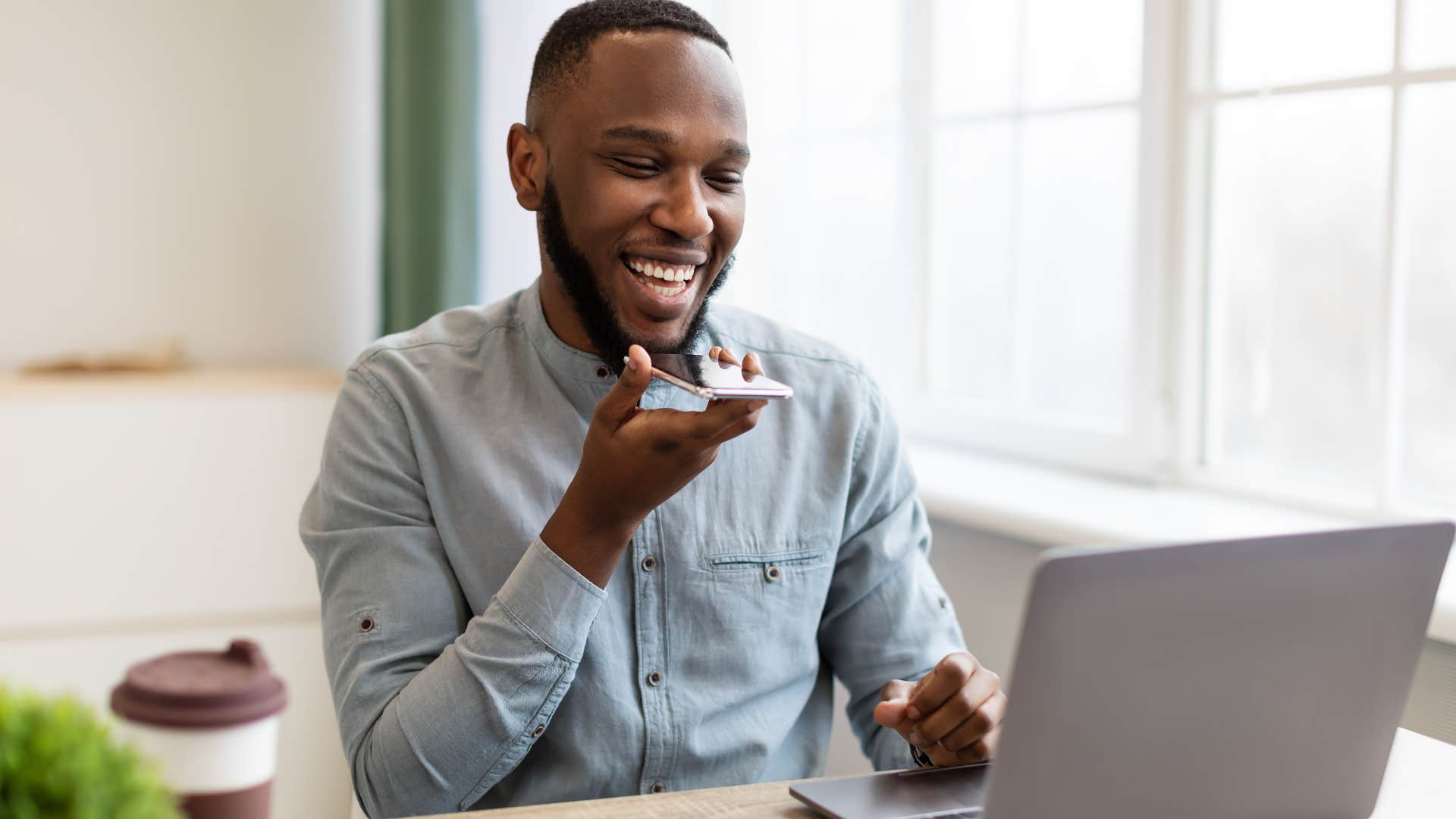 Gen Z man following old school manners of answering the phone politely