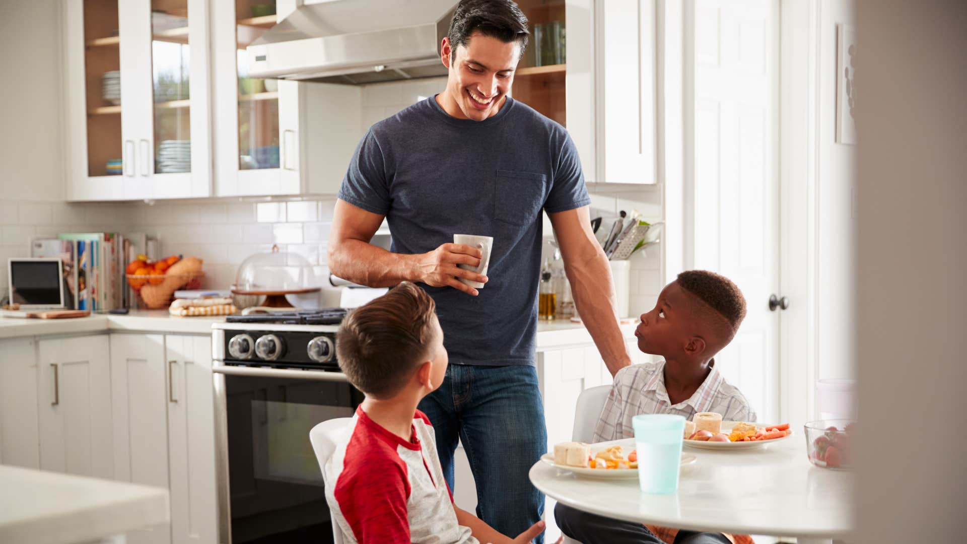 father watching kids on structured playdate