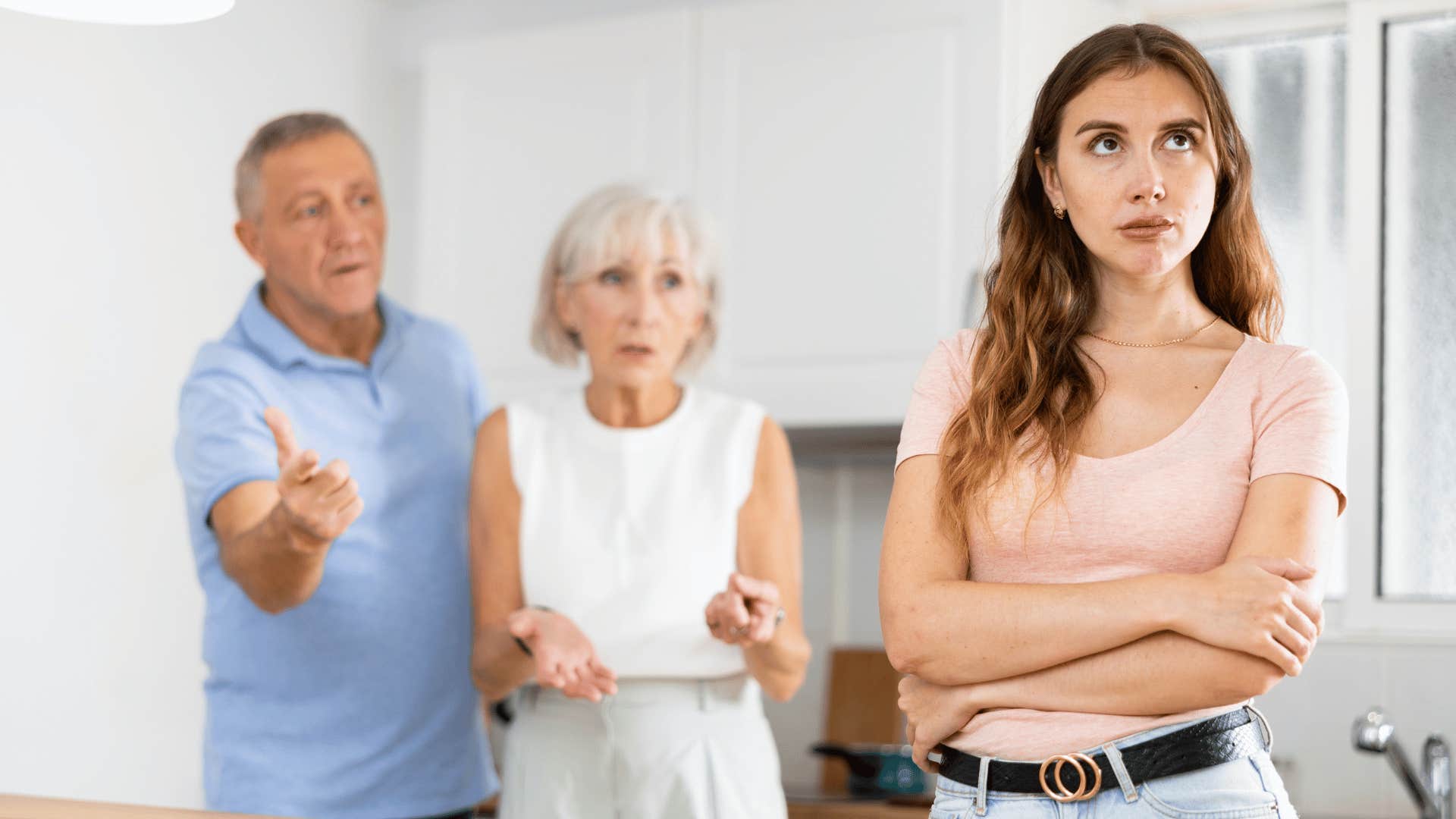 woman being criticized by her parents