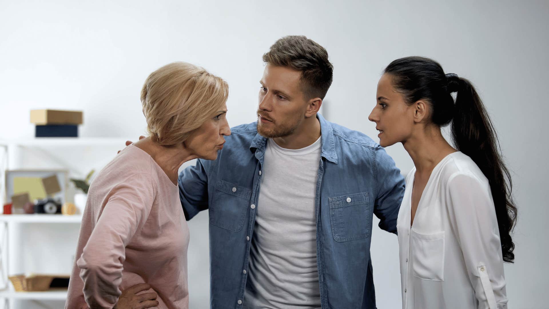 woman fighting with son and his wife