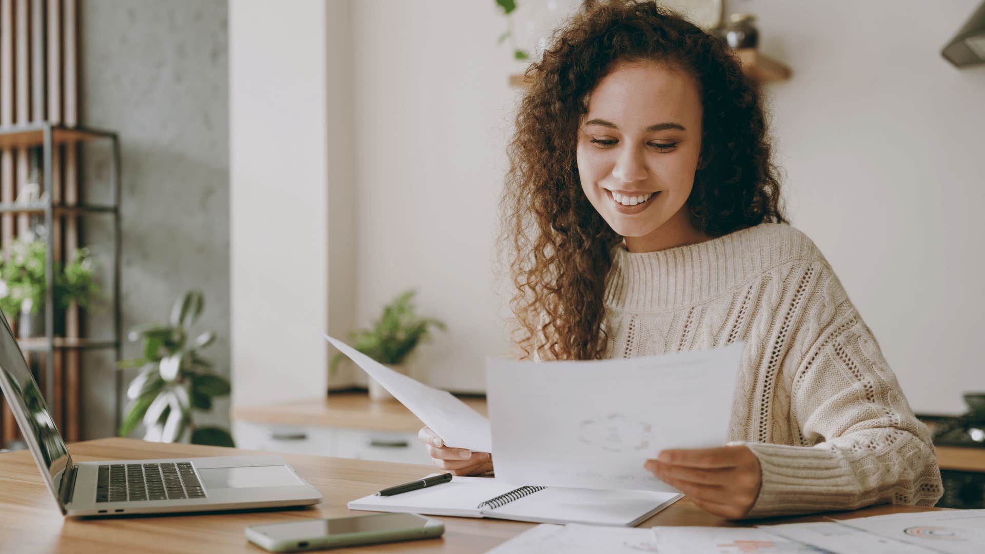 woman looking through documents 