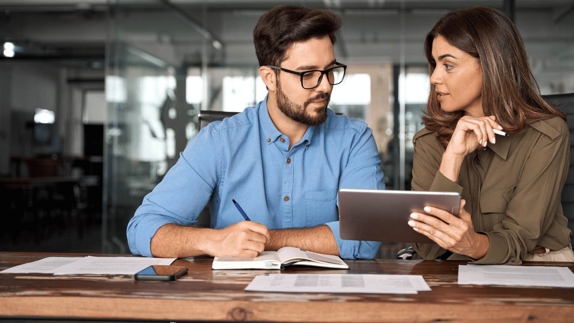 woman putting arrogant person in his place by focusing on the task at hand