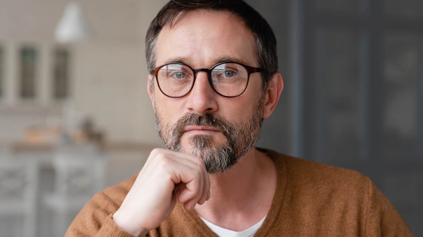 Man looking solemn after saying phrases people with a low IQ say often.