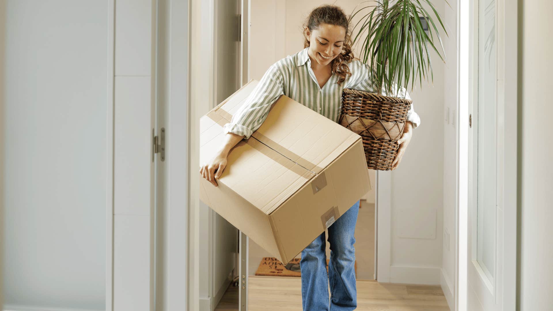 woman carrying boxes