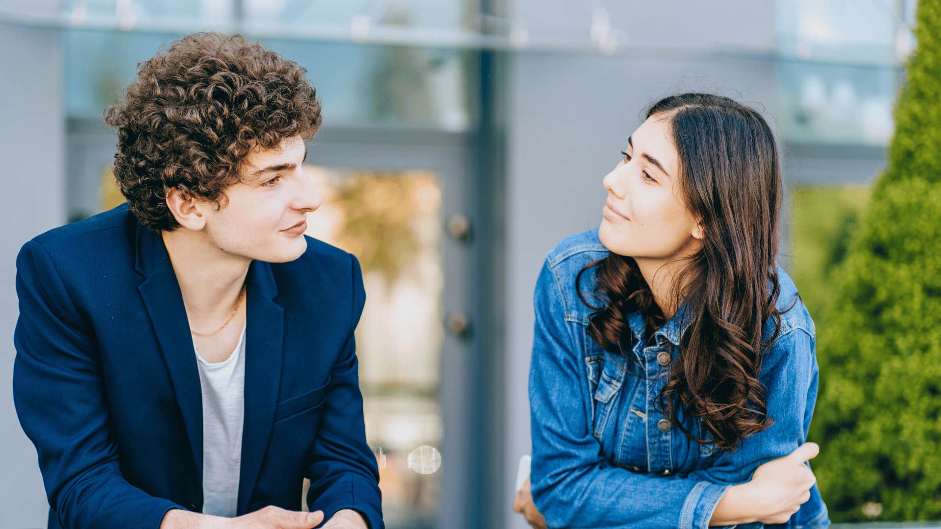 man and woman talking 