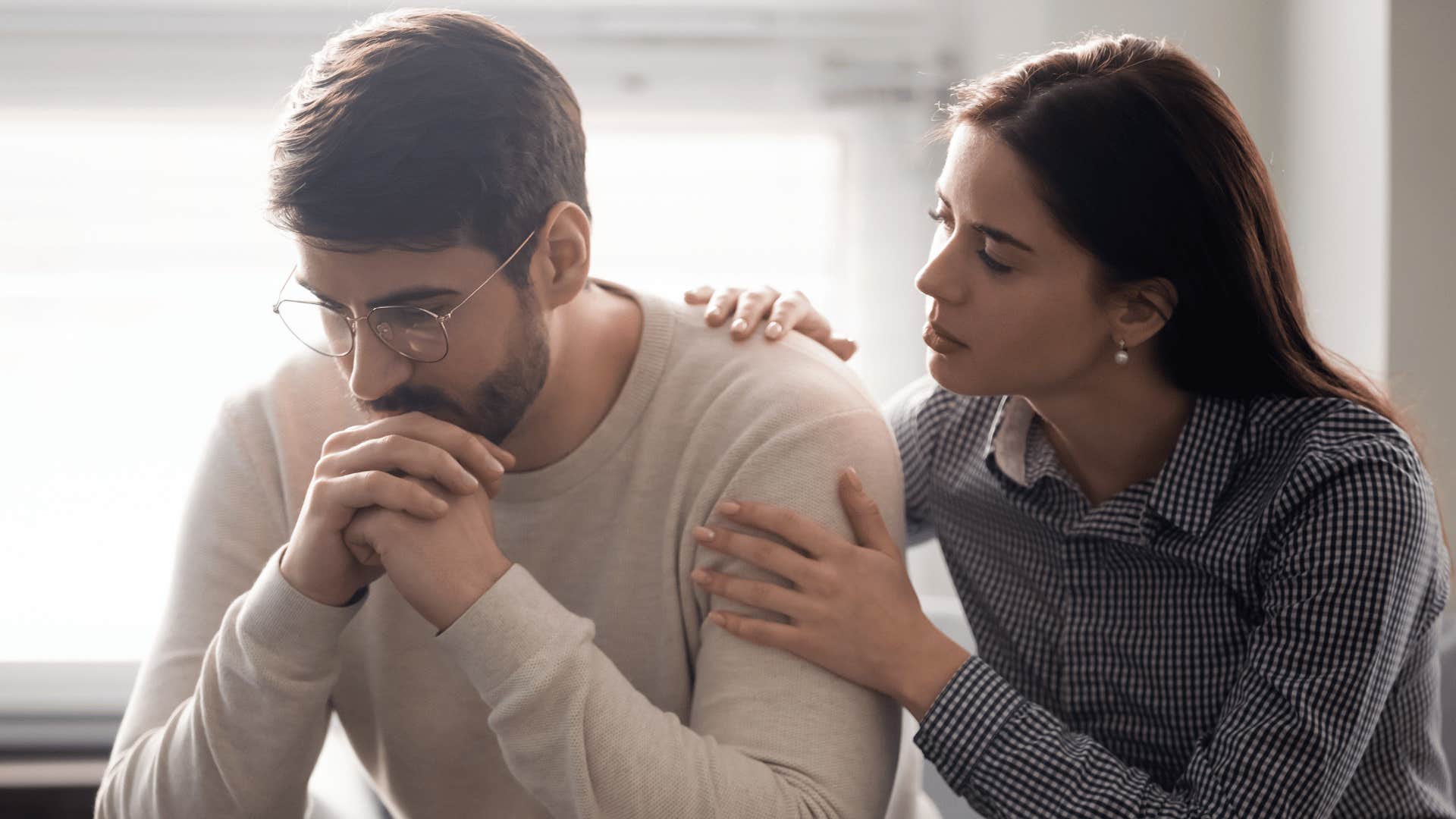 man and woman talking 