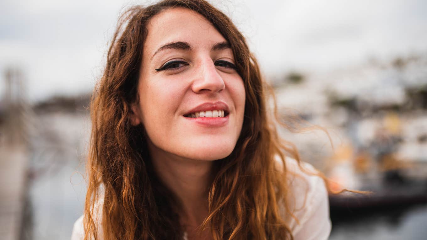 woman with brown hair smiling