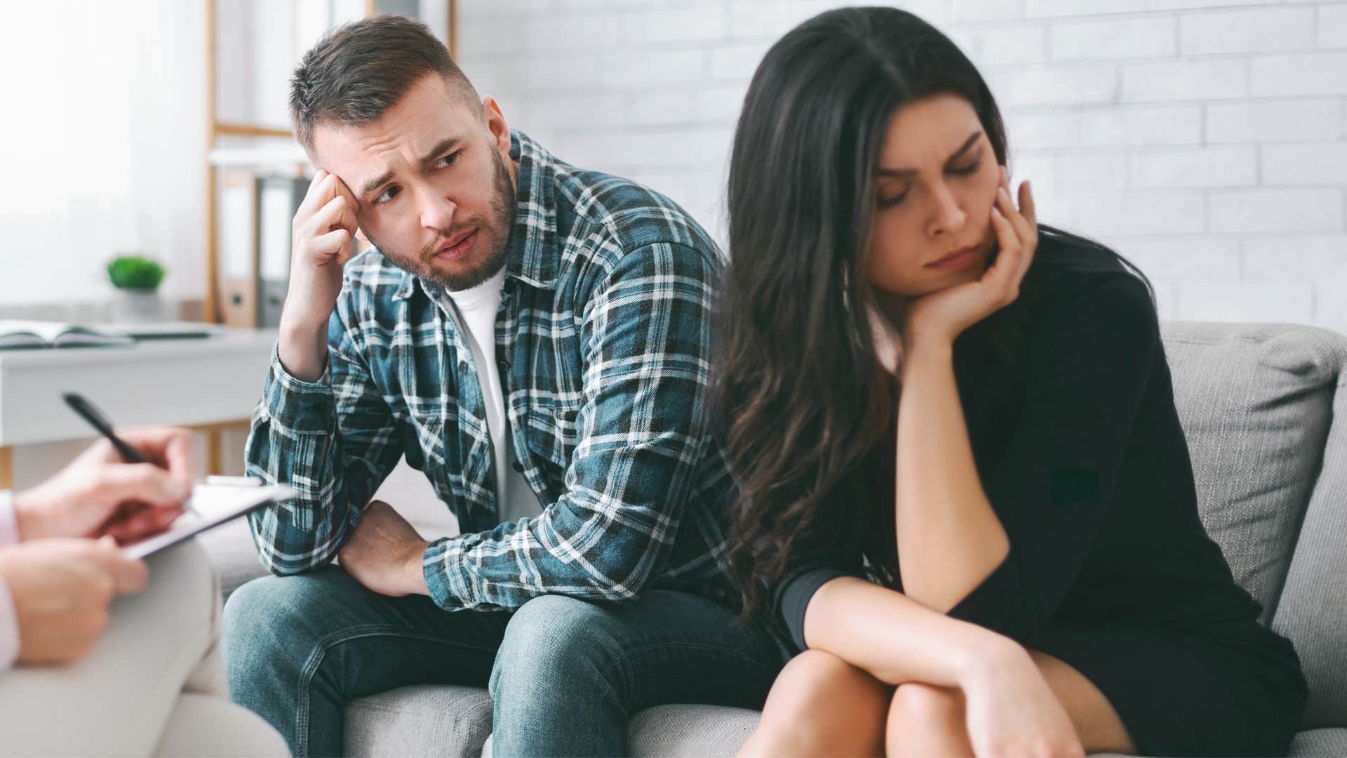 Woman looking upset with her partner in therapy. 