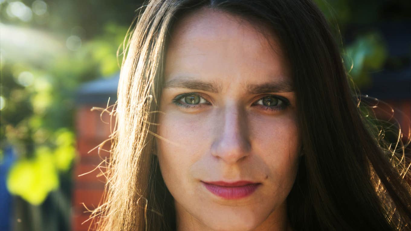 woman wearing lipstick smiling 