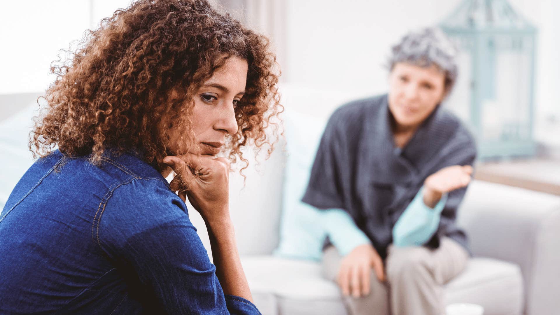 sad woman with her older mom