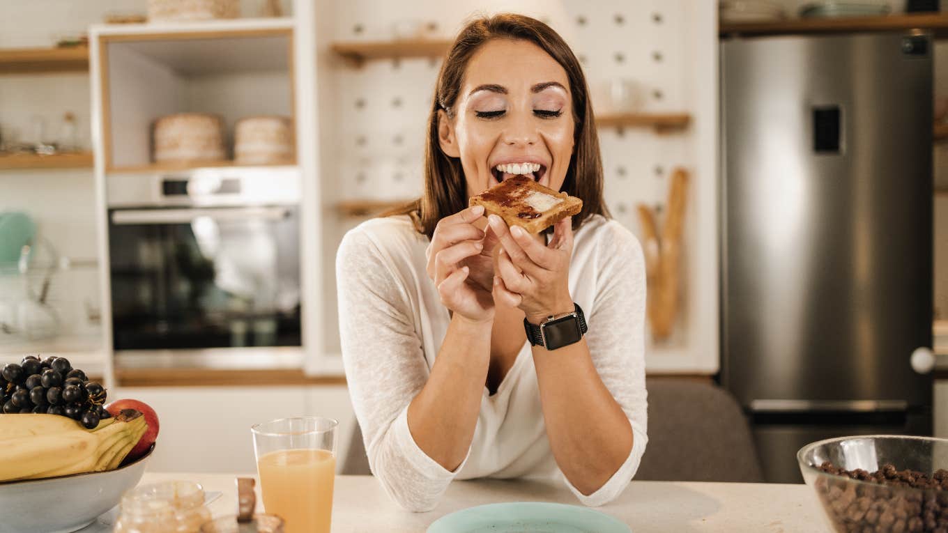 Happy woman eating a poverty food