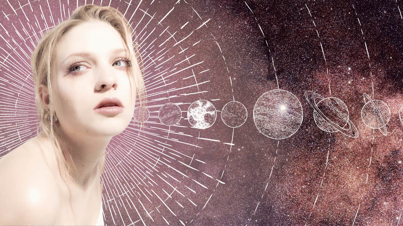 woman in universe looking at planets astrology transits bringing change november 2024