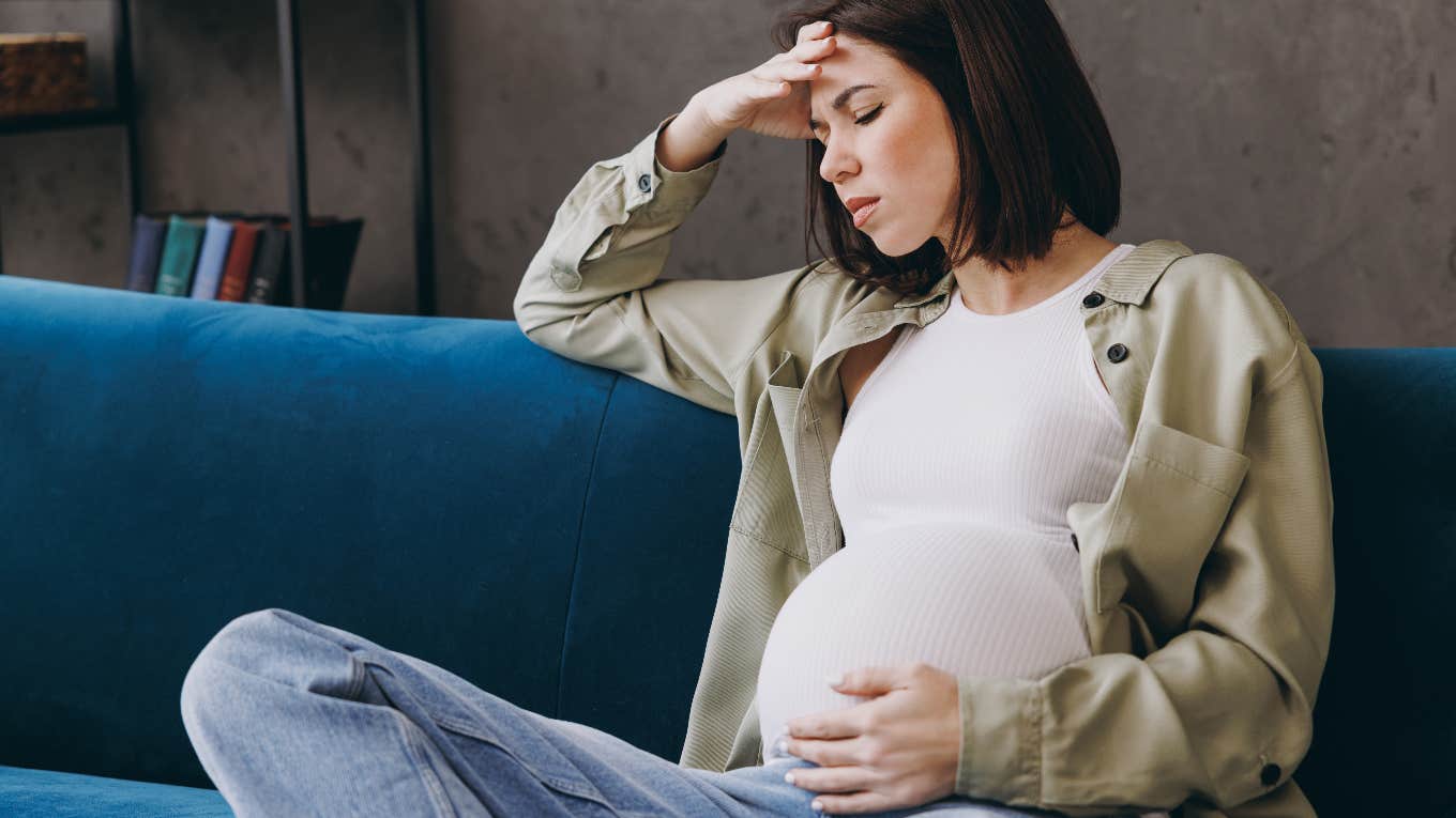 Sad pregnant woman after quitting her job