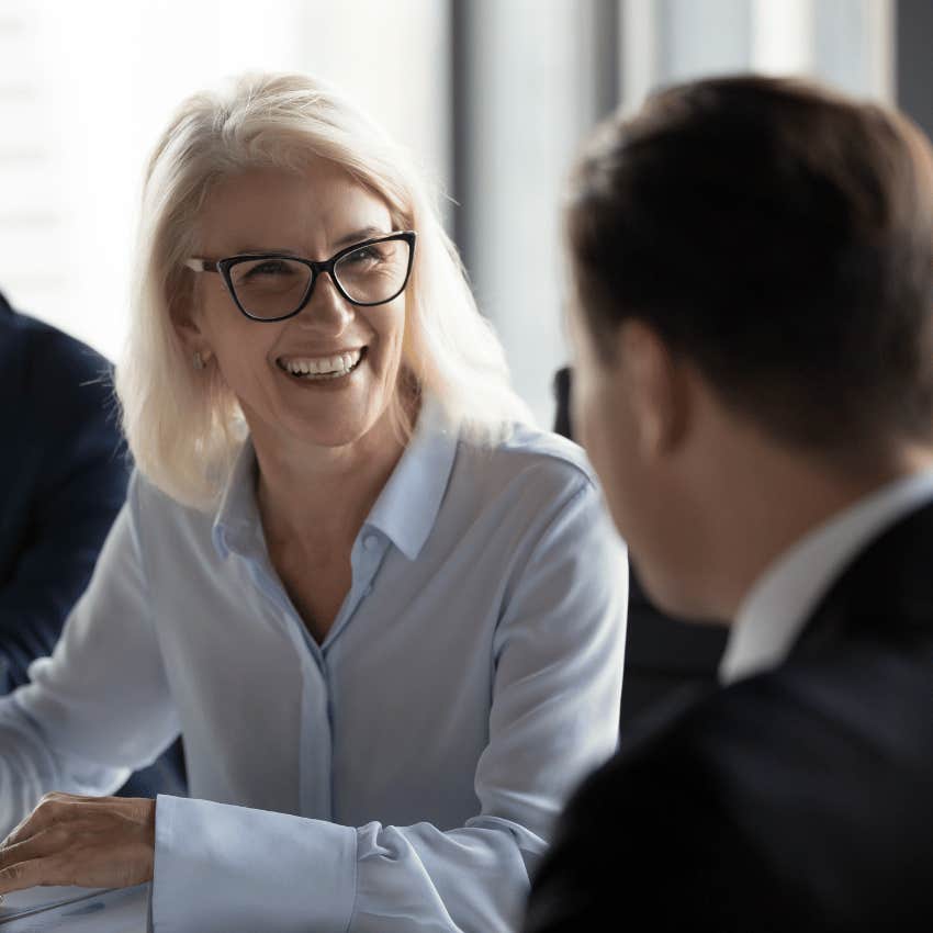 professional woman smiling at a man