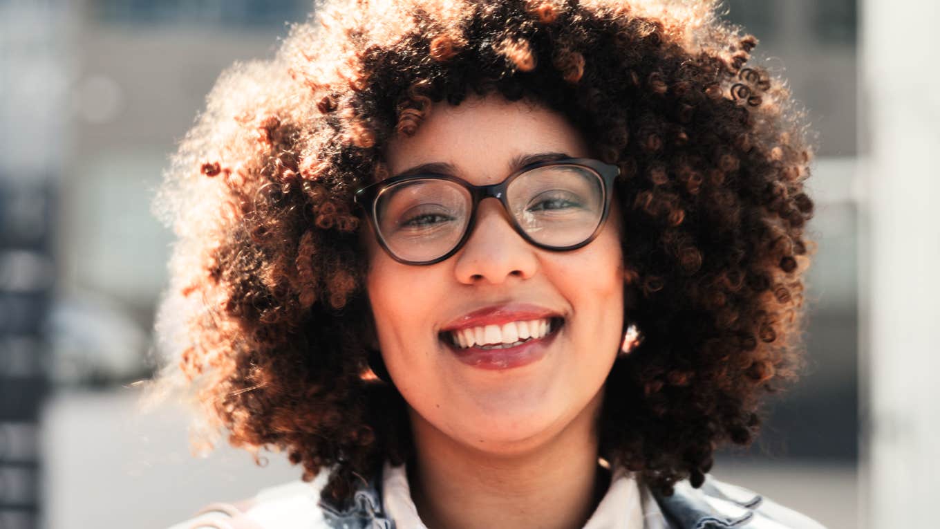 Confident woman smiling