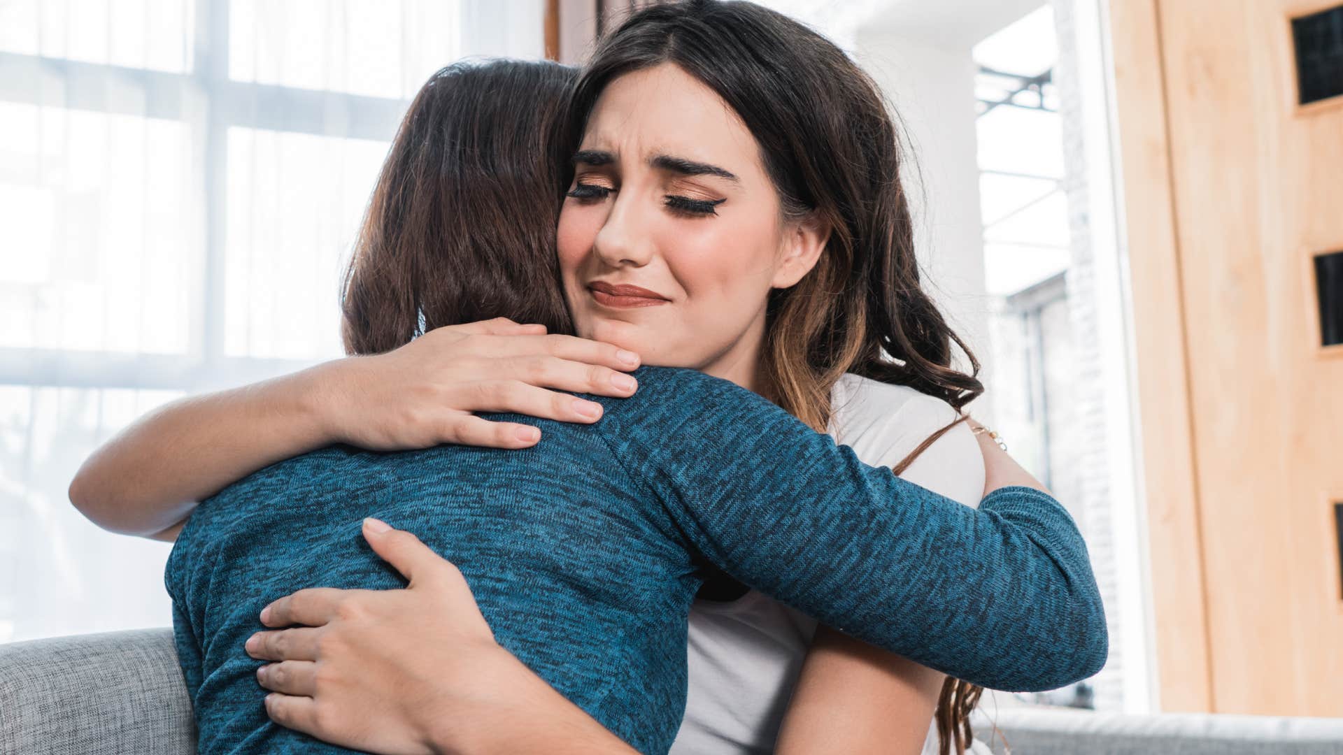 Woman hugging her friend.