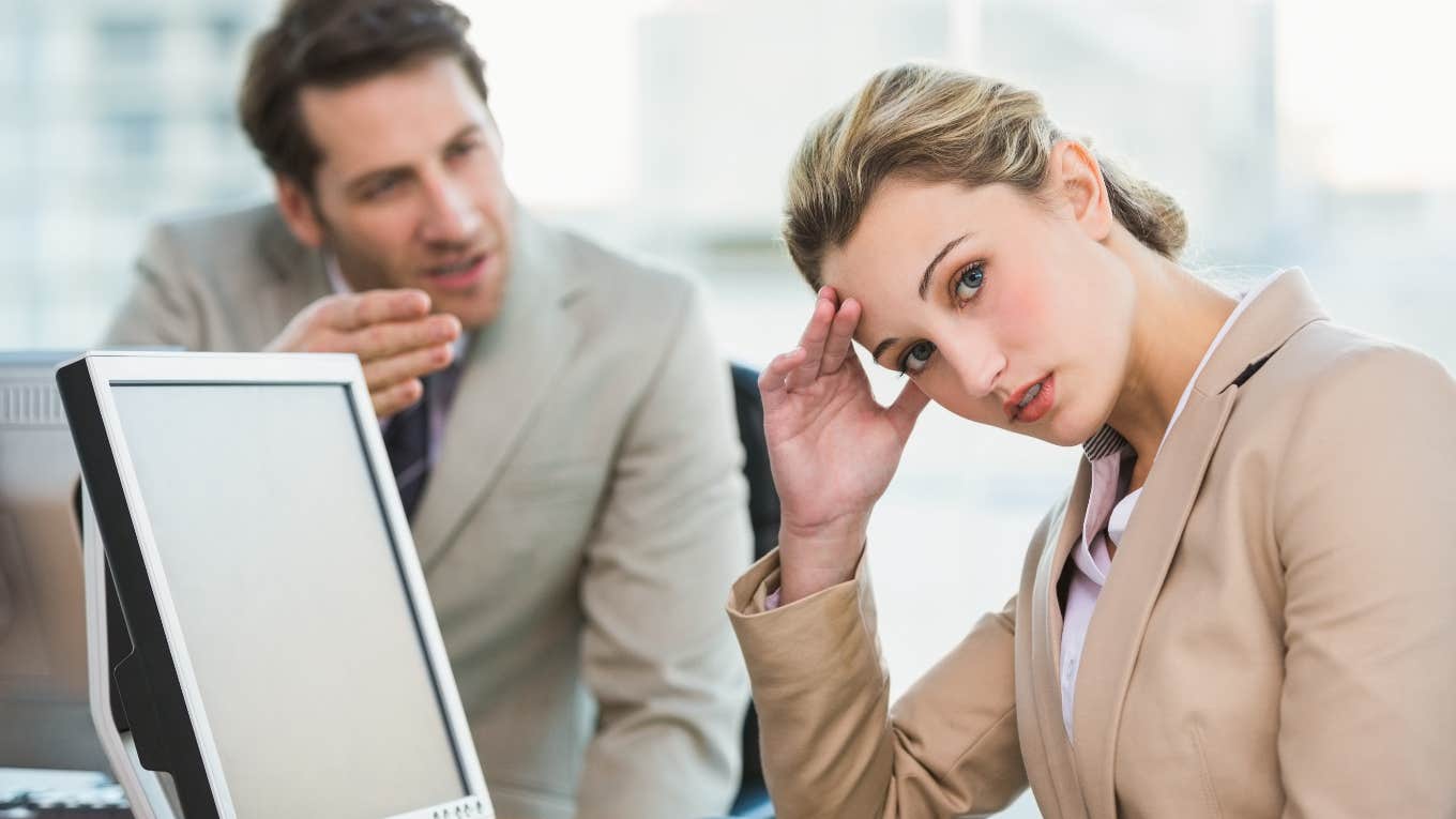 Woman annoyed by her rude co-worker