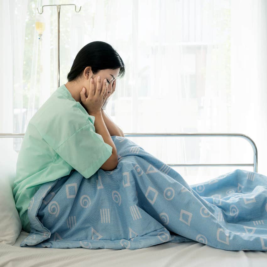 Sad woman alone at the hospital