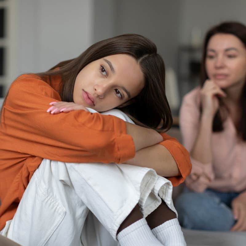 Unhappy teen girl feeling sad after argument with mother