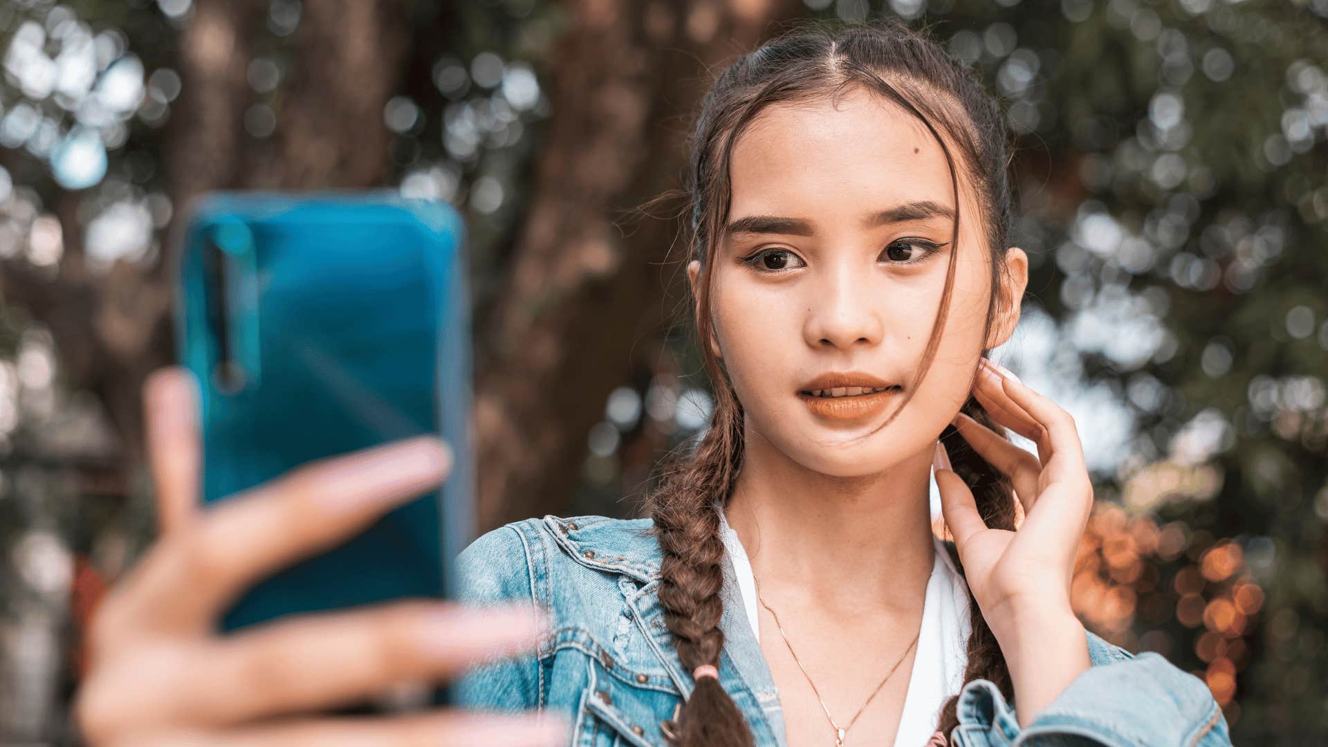 young woman taking a selfie