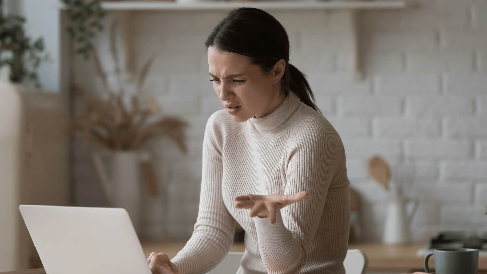 frustrated woman at computer 