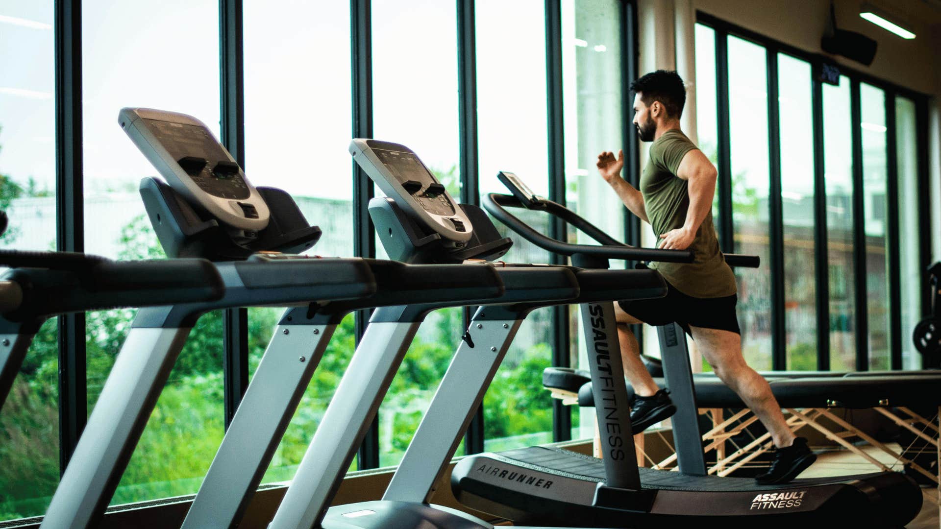 man running on treadmill