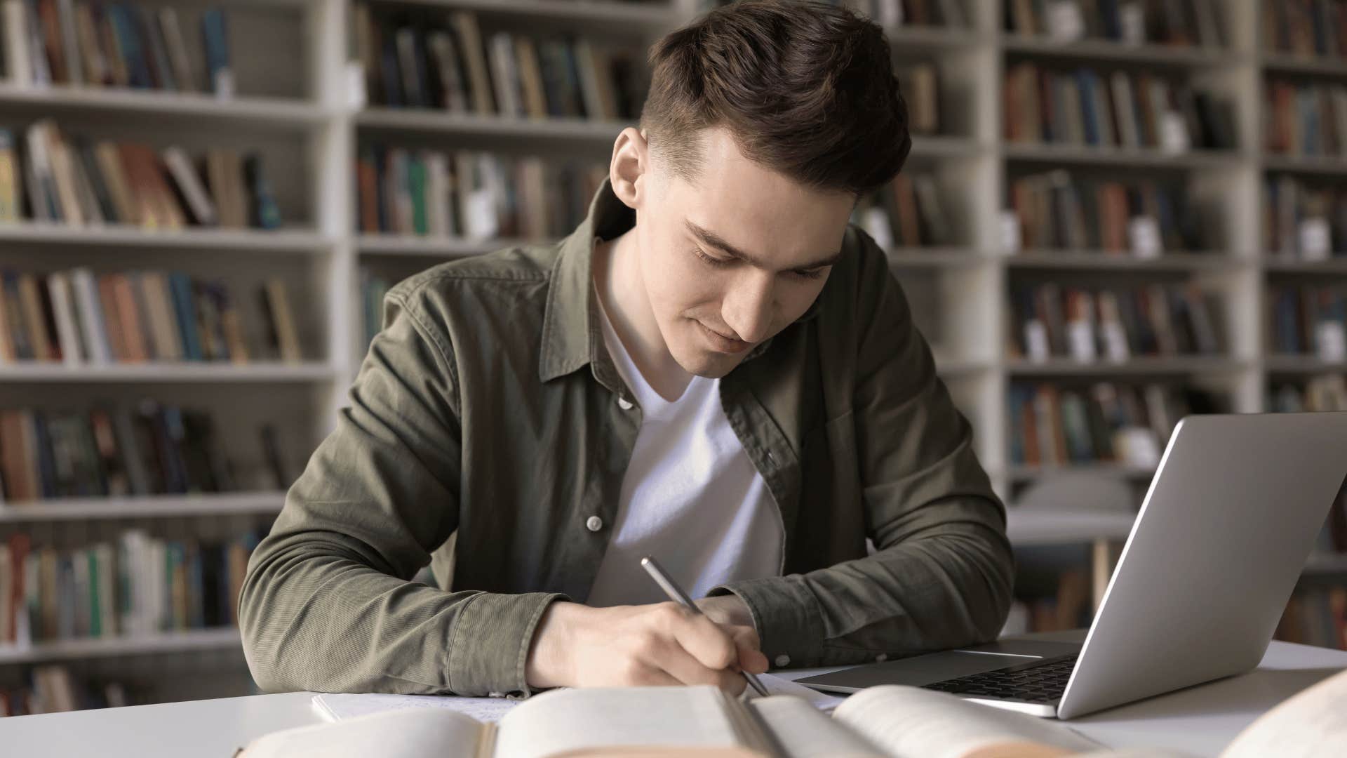 man studying in library 