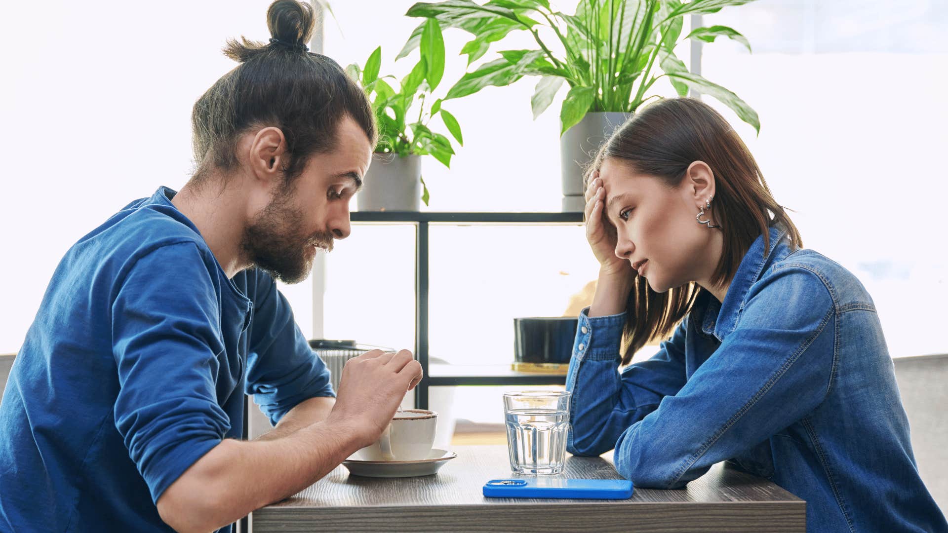 man and woman looking upset while on a date