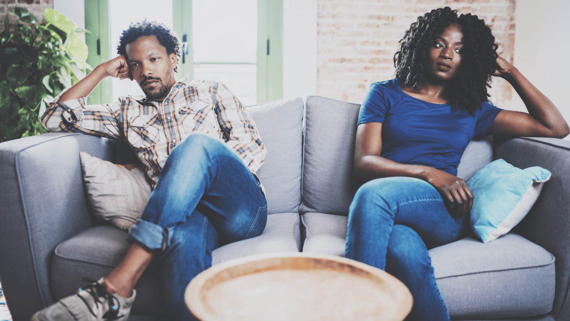 man and woman on couch 