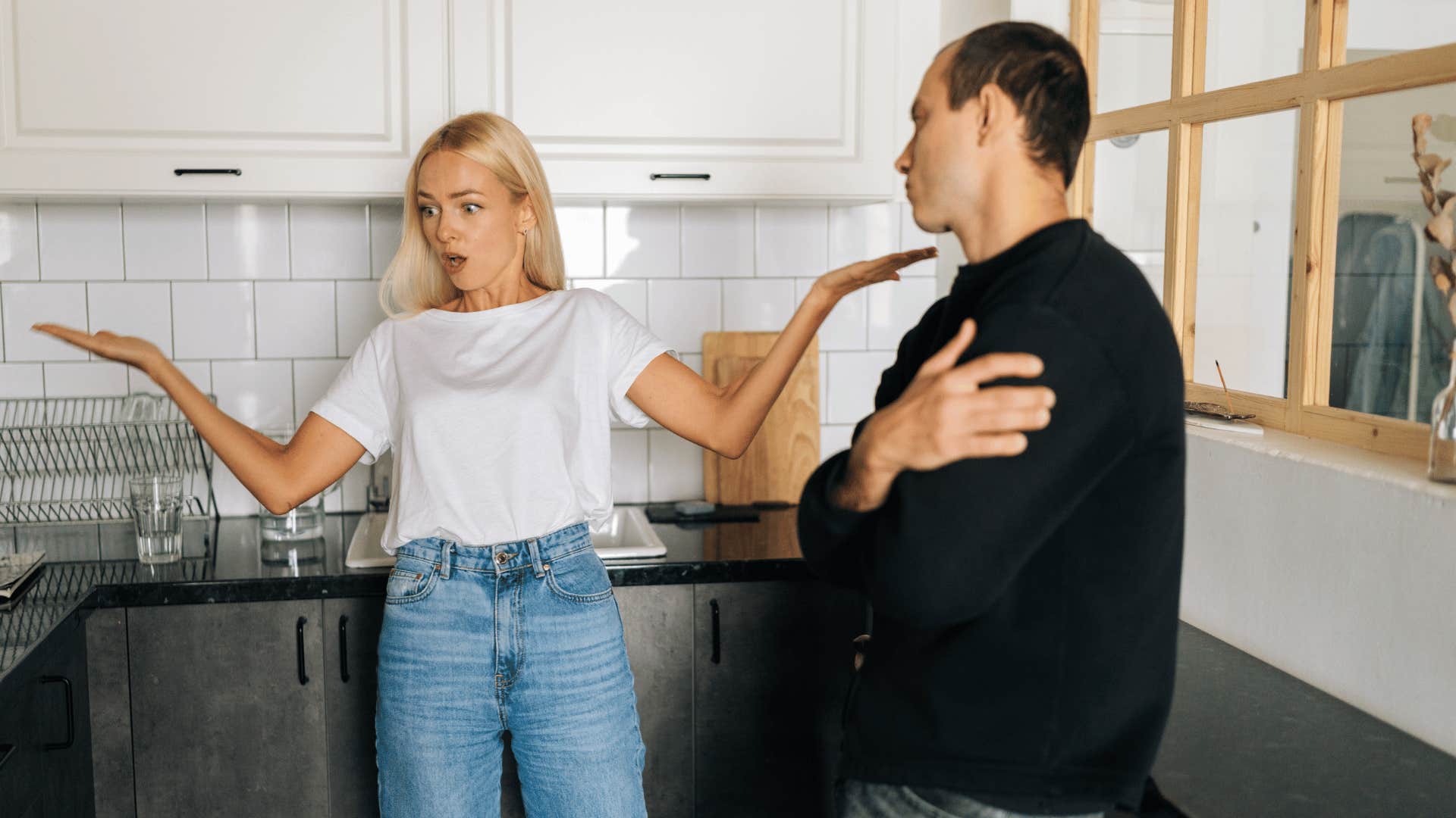 couple arguing in kitchen